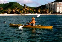 [IMG: Sea-kayaking with the Atrium on the right] (c) 1997 GoBeach Vacations